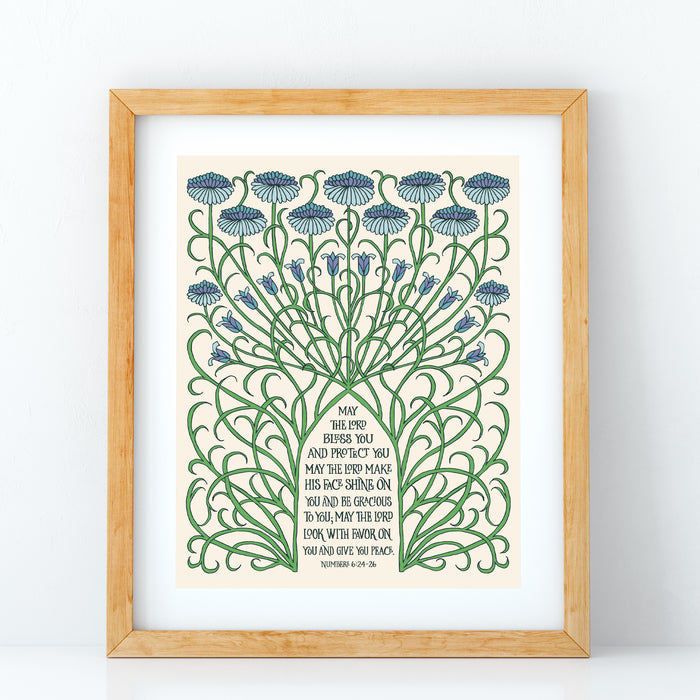 Be blessed daily by "The Blessing" art print, with hand-lettered Numbers 6 text surrounded by a unique lattice illustration of stems and floral buds, shown here framed against a white background.