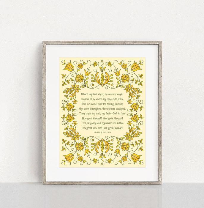 Be reminded of truth with the "How Great Thou Art" print featuring the beloved hymn text surrounded by tangerine and olive floral against a cream background, shown styled in a frame against a white background.