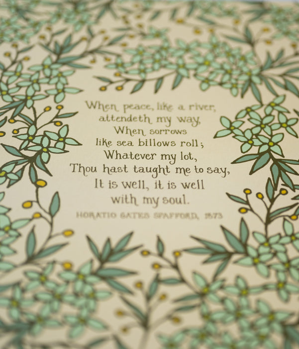 Hand-lettered text closeup of It Is Well With My Soul Art Print featuring light green floral surrounding the hand written hymn on a cream background