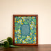 We Gather Together art print — a 8x10 hymn art print with bright green, blue and yellow florals in an oak frame styled on a table with dried flowers