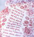 Floral and text detail of All Creatures of our God and King tea towel is printed in rich crimson