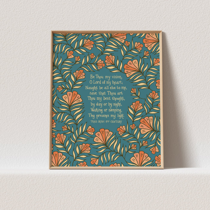 This "Be Thou My Vision" hymn art print features the much loved hymn text surrounded by a unique peach floral against a teal background; shown here in a light wood frame against a white background.