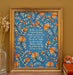 This "Be Thou My Vision" hymn art print features the much loved hymn text surrounded by a unique peach floral against a teal background; shown here in a gold frame against a khaki colored background, and styled with a vase of dried grasses and a ceramic figurine.