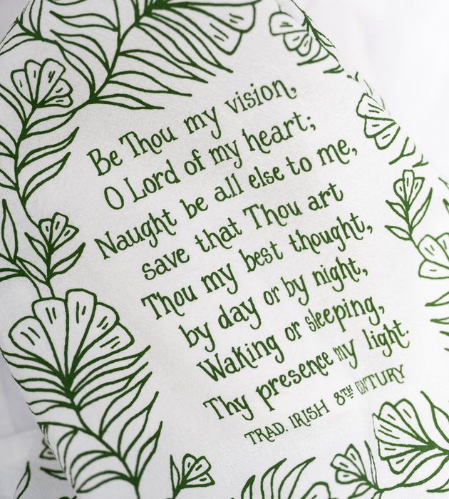 Text and illustration detail of the Be Thou My Vision tea towel, printed in forest green and features hand lettered text surrounded by illustrated botanicals.