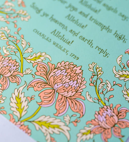 Illustration detail of hymn art print of Christ the Lord is Risen today, featuring hand-lettered hymn text and hand illustrated florals in corals and pinks against a mint green background.