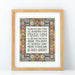 Doxology hymn art print — biblical wall art showcasing the soft blue, peach, and gold stained glass border that surrounds the hand-lettered text, framed in a light wood frame against a white background.