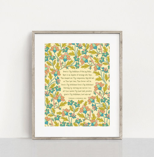 Great Is Thy Faithfulness hymn art print features the cherished hymn, surrounded by a delicate multi-colored floral against a cream background; shown in a light wood frame against a white background.