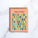 The Happy Birthday! Greeting Card features hand illustrated geometric design in a rainbow of hues against a happy peach background—a blank artsy greeting card ready for your messages of affirmation.