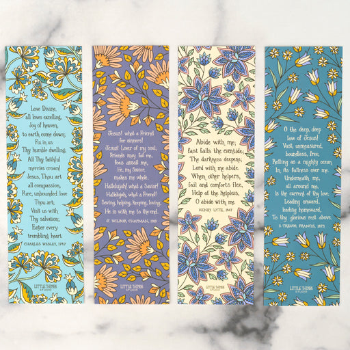 Liven up your library with these lovely hymn bookmarks from the Henry set of 4, which feature hymn lyrics on one side and bold floral patterns on the back, shown here lying flat against white marble background.