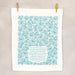 How great thou art tea towel in aqua blue unfolded and hanging with clothes pins