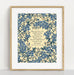 The "It Is Well" hymn art print in 11x14 features hymn text surrounded by a blue florals against a vanilla background, shown in a frame against. a white background.