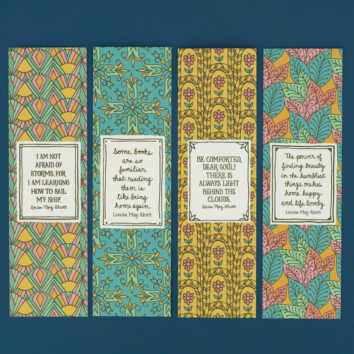 Liven up your library with these lovely bookmarks featuring memorable quotes from the beloved author, Louisa May Alcott, featuring quotes on one side and bold botanical patterns on the back, shown here lying flat against a teal background.