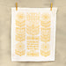 The Power, Love & Self-Control Scripture tea towel is printed in sunflower yellow and features 2 Timothy 1:7; shown hanging with clothes pins