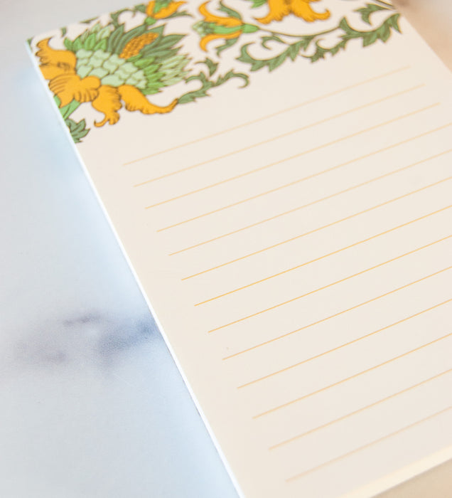 small gold floral illustrated notepad with lines