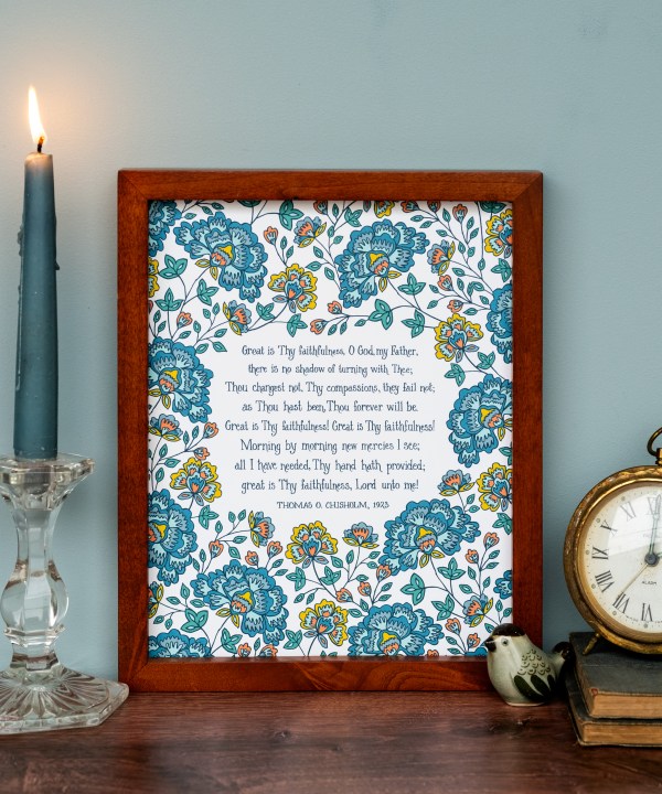 Be inspired daily with this exquisite "Great Is Thy Faithfulness" hymn art print from Little Things Studio — teal floral in classic 8x10, shown styled in a frame with lit candle stick, brass clock, and books.