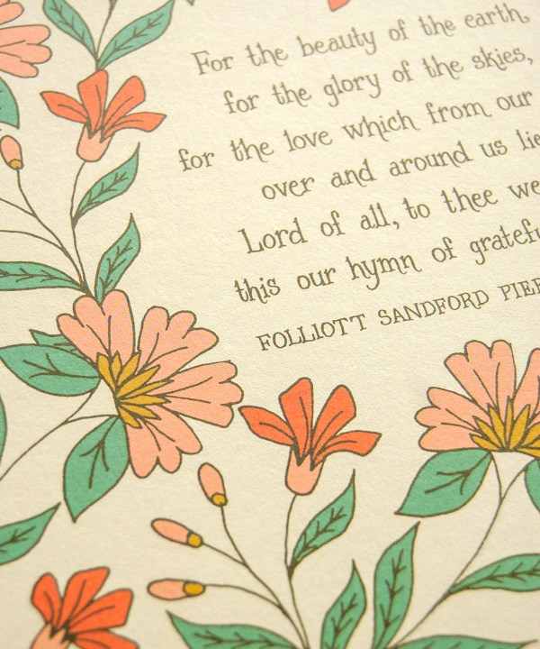 Hand-lettered text detail of Artwork of the hymn, For the Beauty of the Earth — Christian artwork for the home that features hand-lettered hymn text surrounded by floral design in pink, yellow, light red, and green