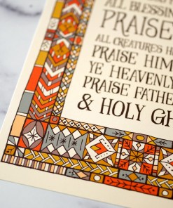 Doxology hymn art print — biblical wall art pictured as an 11x14 print showcasing a muted blue, red, and yellow stained glass border around dark hand-lettered text detail