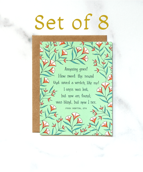 The "Amazing Grace" greeting card set of 8 features the adored hymn framed by a delicate floral with a fresh green background.