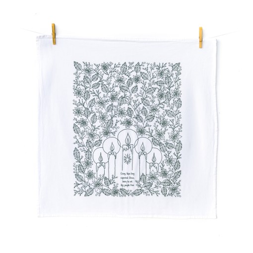 Come Thou Long Expected Jesus Christmas/advent tea towel is hand-lettered with a floral border and printed in evergreen on a 100% cotton tea towel, shown hanging with clothes pins