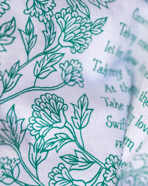 Text detail of The Take My Life and Let It Be hymn tea towel featuring the beloved hymn is printed in an aqua green.