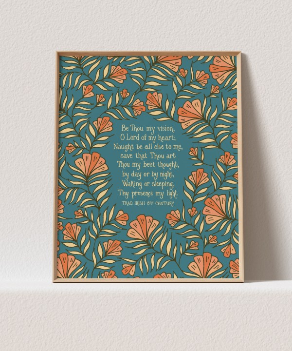 This "Be Thou My Vision" hymn art print features the much loved hymn text surrounded by a unique peach floral against a teal background; shown here in a light wood frame against a white background.