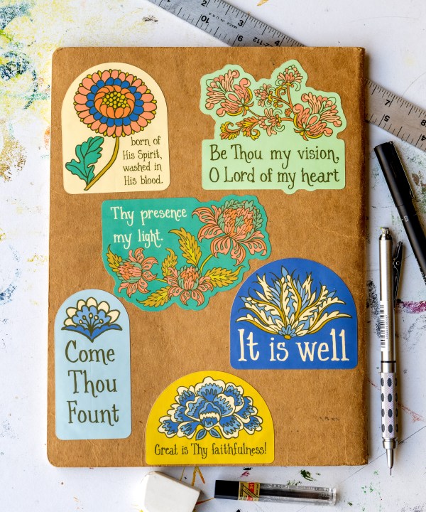 A journal decorated with Little Things Studio stickers