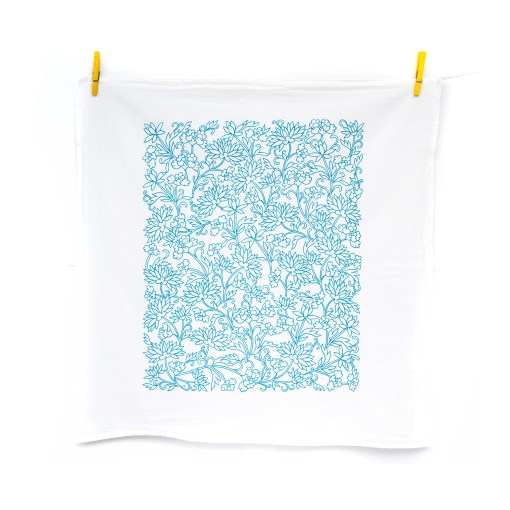 Little Things Studio presents floral tea towels — the Mabel floral tea towel features lively floral illustrations in vibrant turquoise, shown up unfolded and hanging with clothes pins