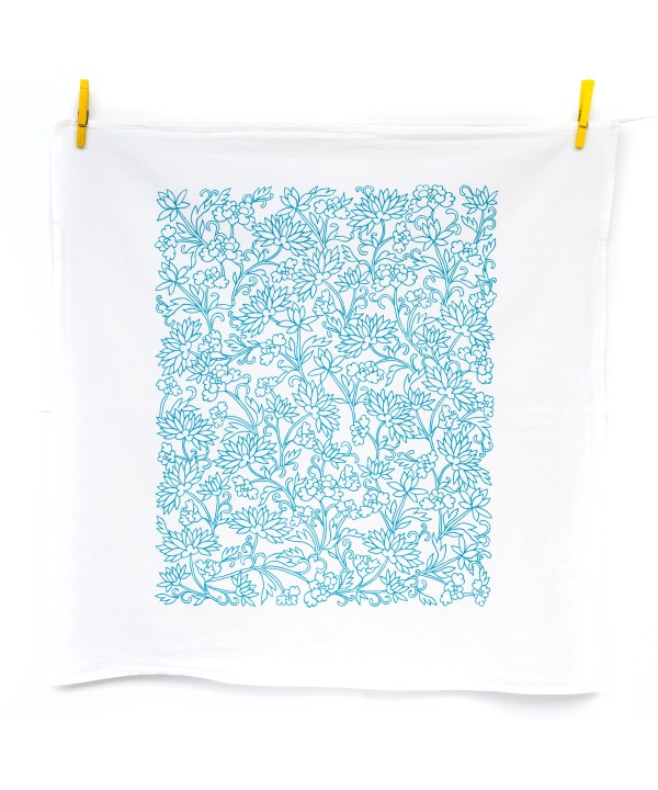 Little Things Studio presents floral tea towels — the Mabel floral tea towel features lively floral illustrations in vibrant turquoise, shown up unfolded and hanging with clothes pins