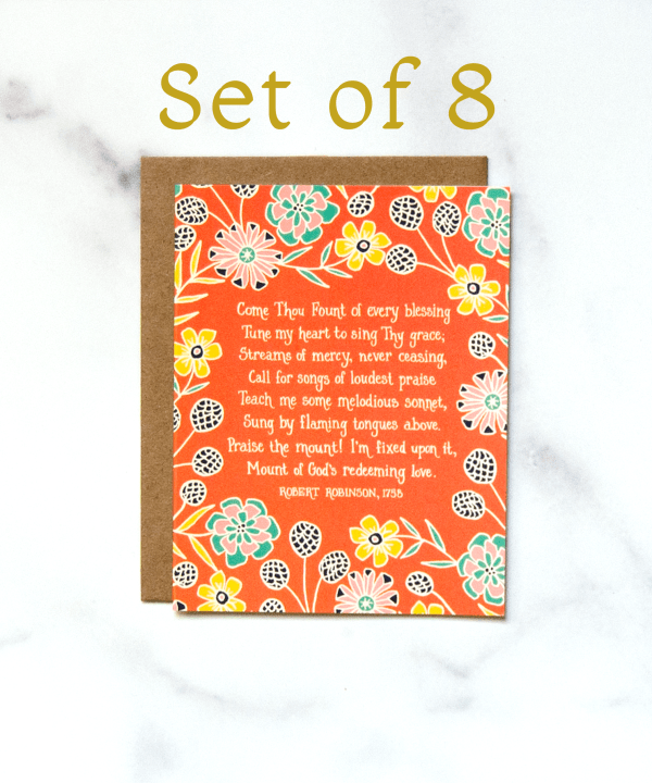 The "Come Thou Fount" Hymn Greeting Card set of 8, features a verse of the beloved hymn text framed by a bold floral with an orange background.