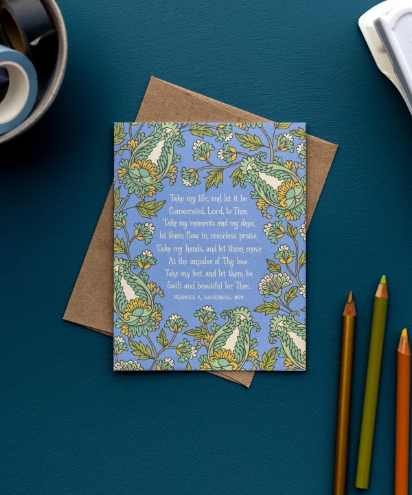 The Take My Life and Let It Be hymn greeting card, framed by saffron and moonstone floral against a stormy blue background, is styled with a kraft paper envelope, colored pencils, and washi tape.